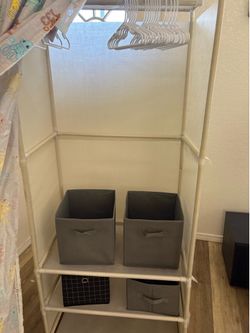 Baby closet with hangers and organizers