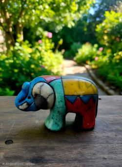 Vintage South African Raku pottery elephant figurine featuring a crackled glaze 4"×6"