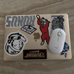 MacBook W/ Wireless Logitech Mouse