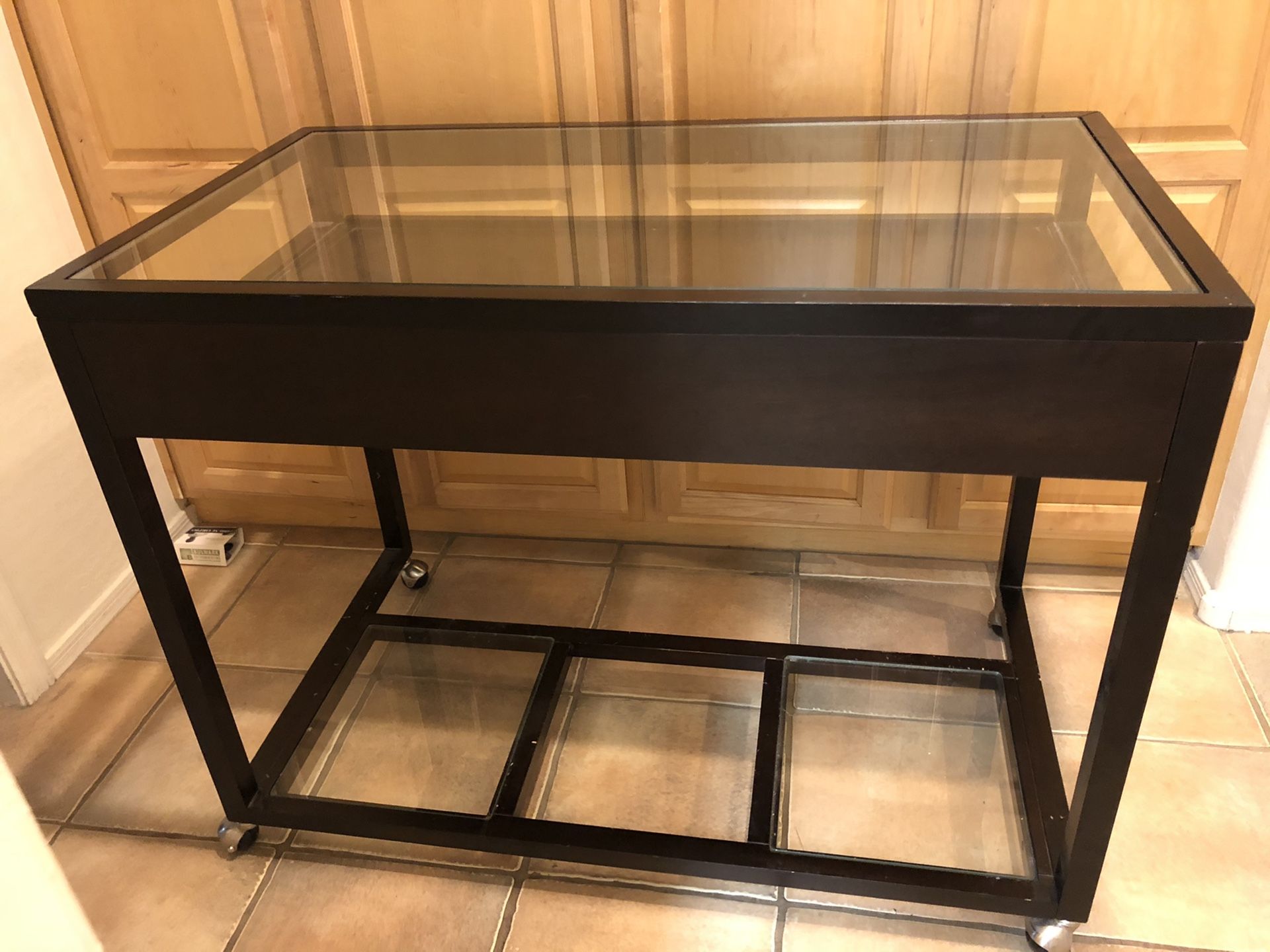 Glass desk on wheels