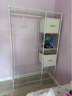 Clothes rack with shelves