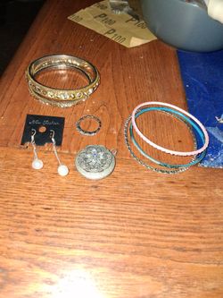 Five Bracelets And Eartings Pendant And A Ring