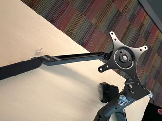 Dual adjustable monitor arm w/ 2 vesa face plates