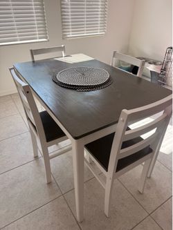 5 piece solid wood dinning table set.