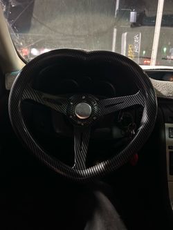 Carbon fiber heart shaped steering wheel