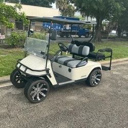 White 2007 ezgo txt 4 seat Passenger golf cart alloy 14”rims flip seat