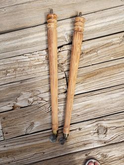 Wood Leg Off Of A Piano With metal casters