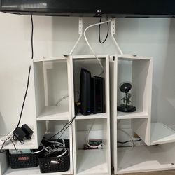 White TV stand and shelf