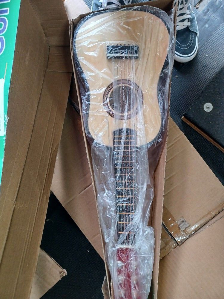 child's toy guitar