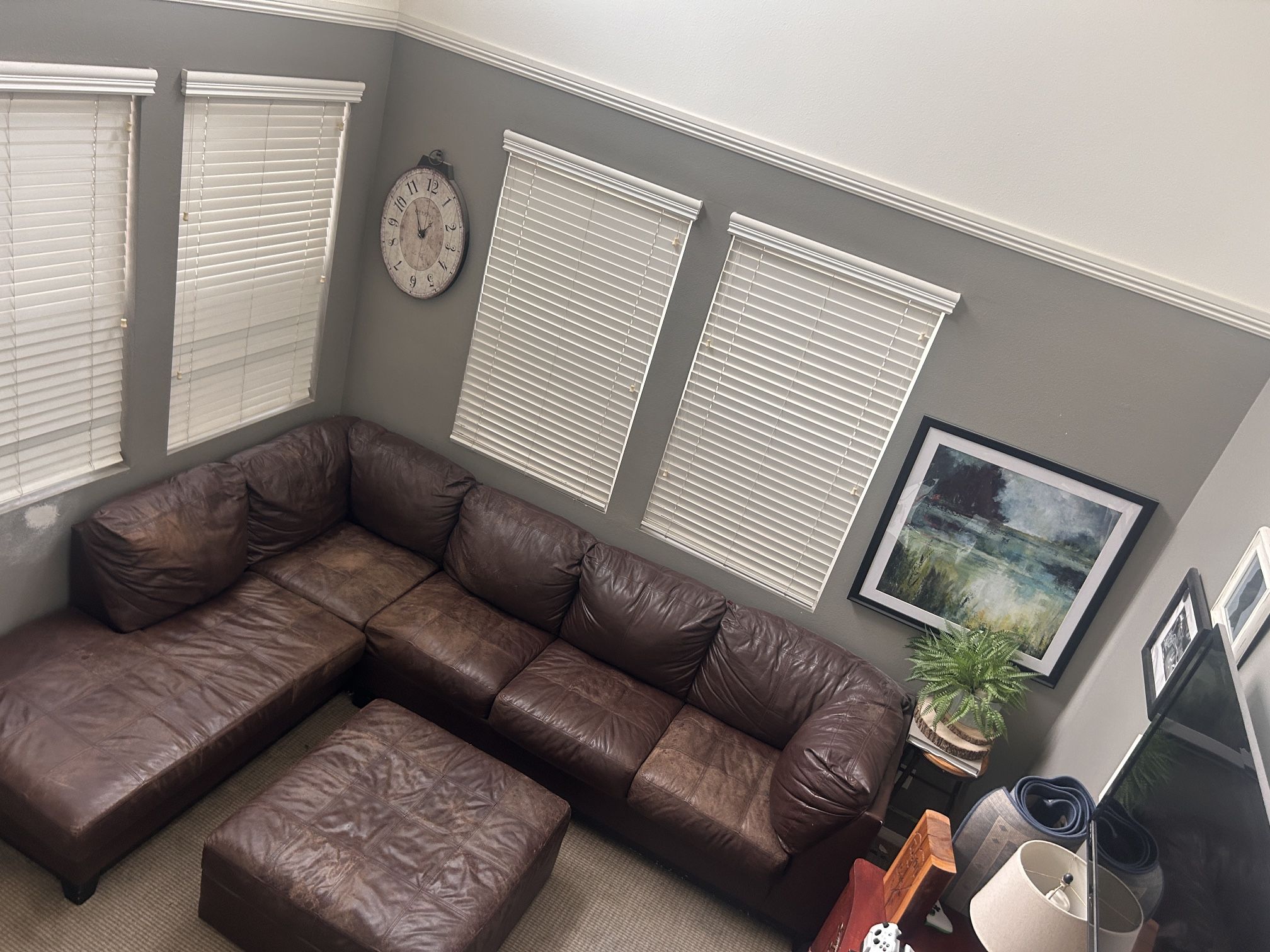 Brown leather Sectional with Ottoman