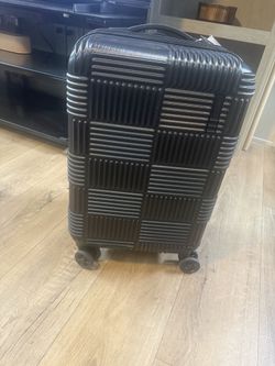 American Tourister NXT Checkered Carry On Spinner
