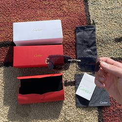 Black and gold Cartier glasses diamond cut style lens