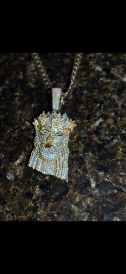 Gold chain with diamond Jesus pendant