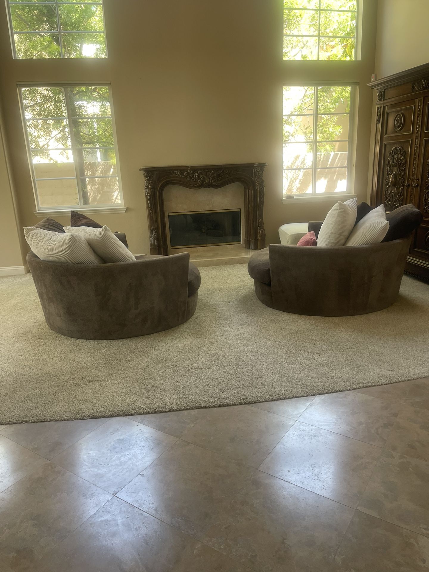 Two Oversized Brown Chairs