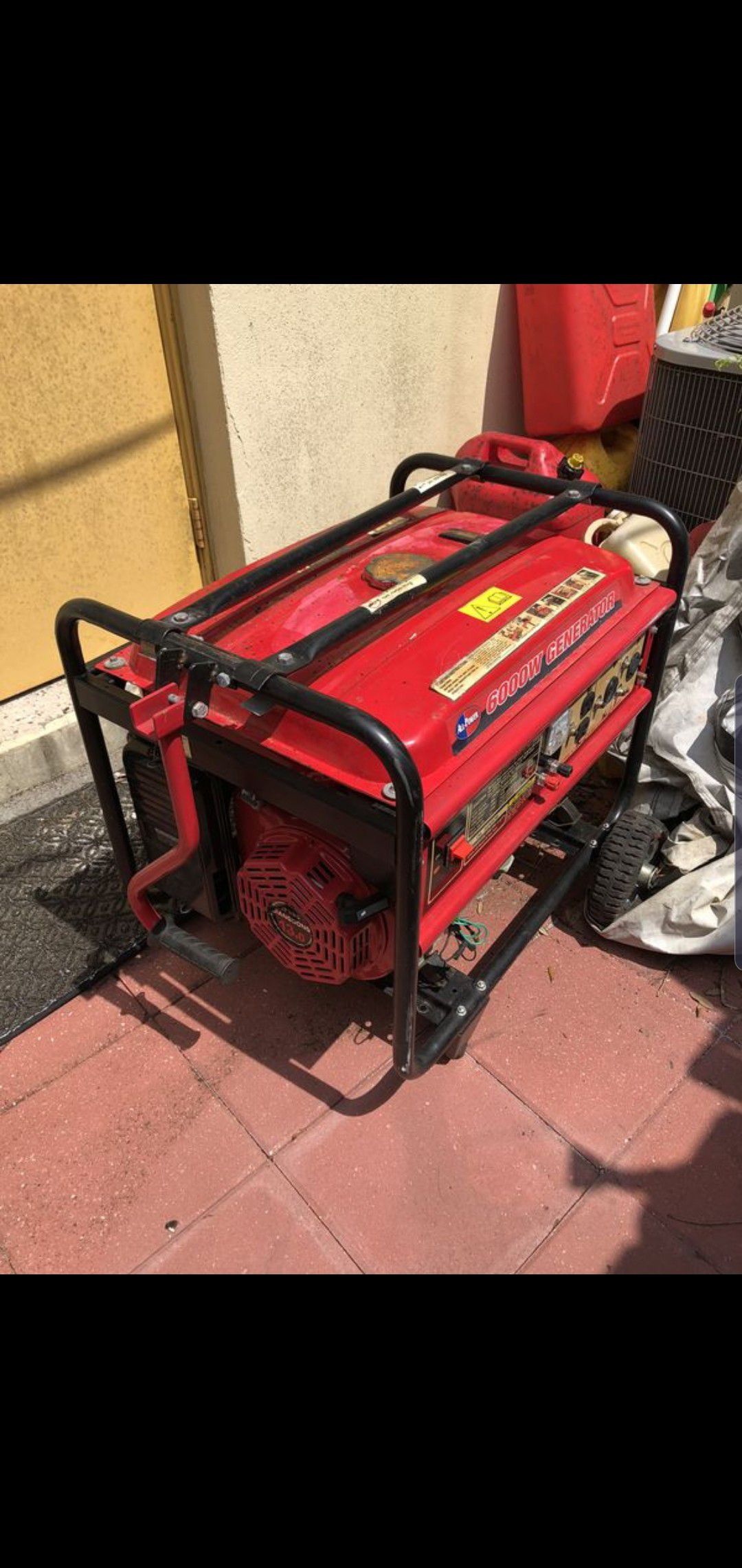 Generator 6000 watts with gas cans and extension cords