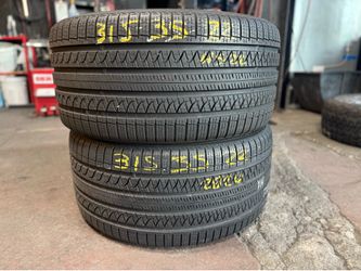 22” tires yokohama 315/35/22 semi new with free installation $160 both