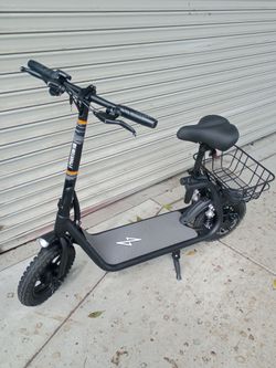 Phantom Gogo Commuter R1 Pro Seated Scooter-15.5 miles per hour Covers 20 miles on a full charge Recharging time is 4-5 hours Rear suspension 450 watt