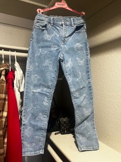 butterfly print jeans