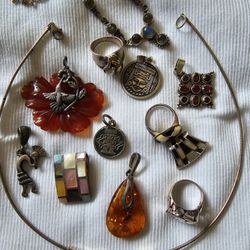 Varied Jewelry pieces.  All Set In Silver.