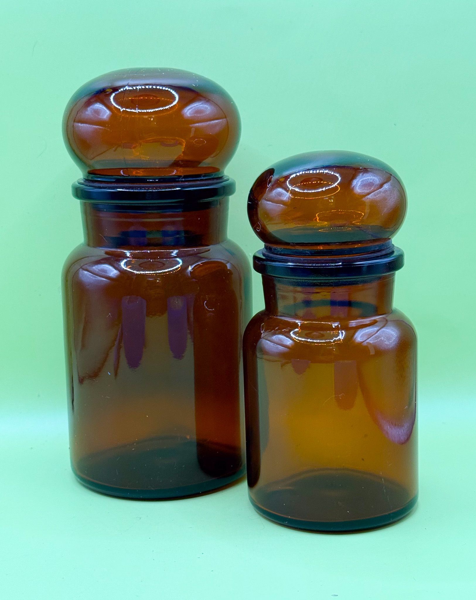 Set Of 2 apothecary jars with lids is a wonderful addition to any antique collection
