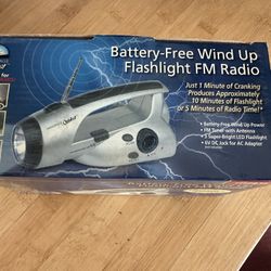 Portable Emergency Radio And Flashlight