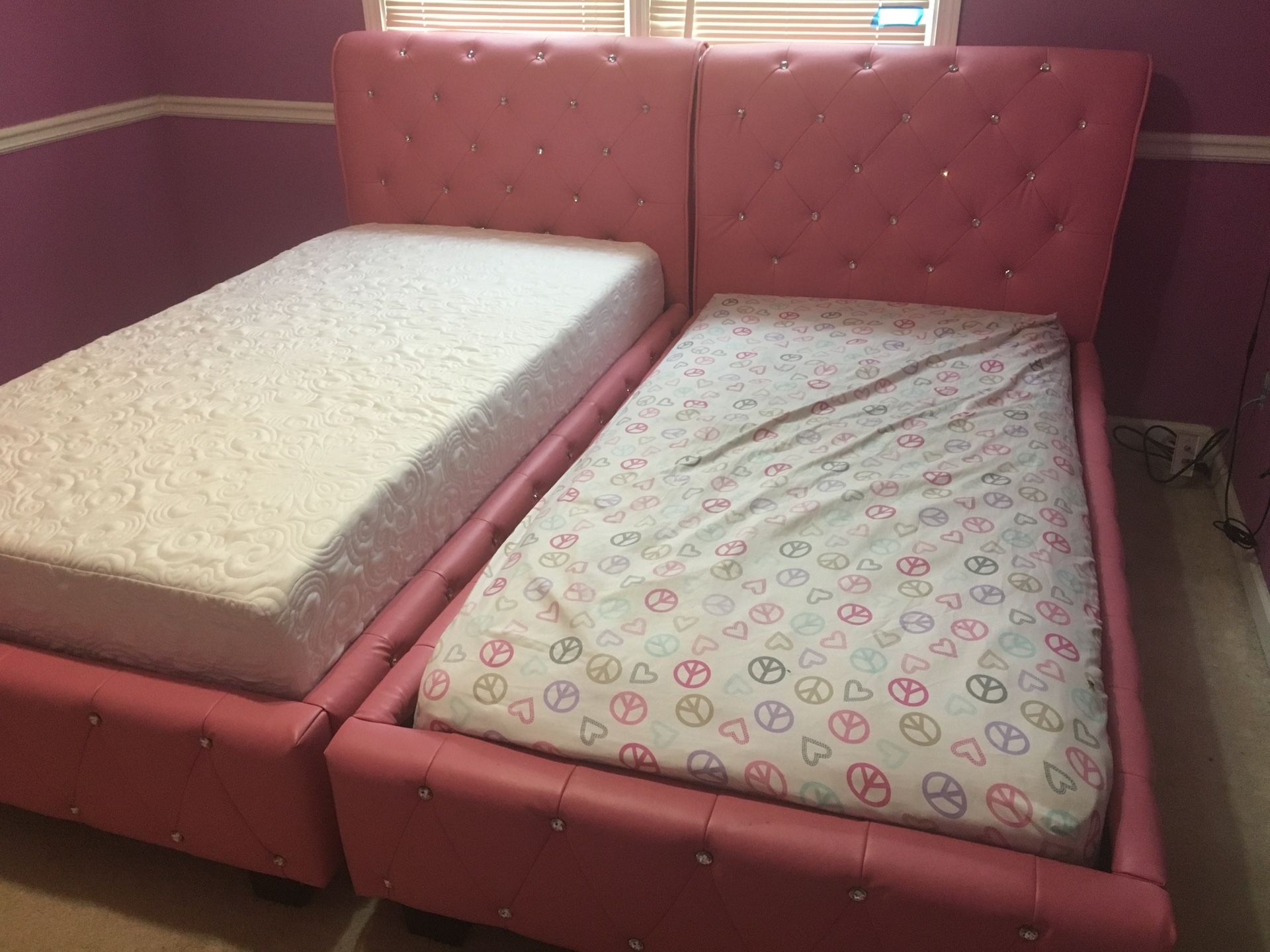 2 Twin Tuffed pink beds