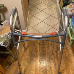 New Walker With Two Roller Wheels On Front