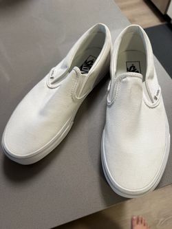 Brand new white vans slip ons