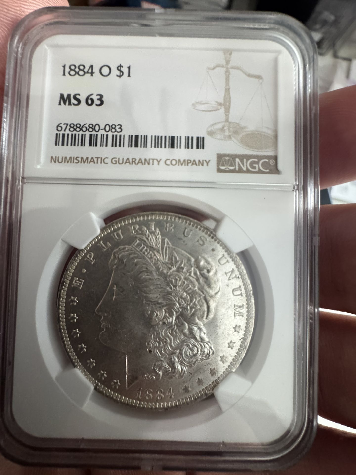 1884 O $1 MS 63
