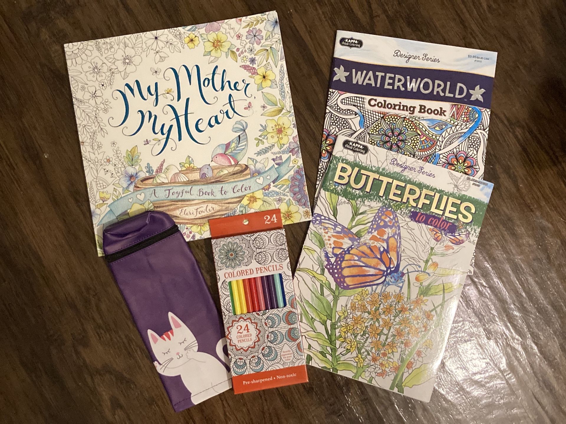 Adult coloring books and colored pencils