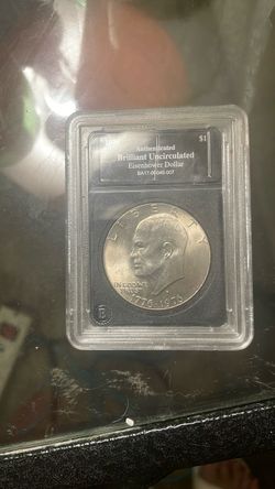 1(contact info removed) Eisenhower Dollar Brilliant Uncirculated Slabbed