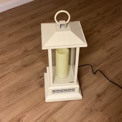 Electric heater.  Never used.  Turned on once for testing.  There is a remote Included.  