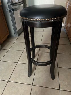 Black swivel wood stool