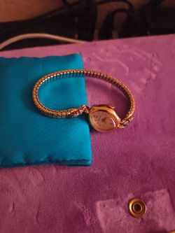 14k wined up watch