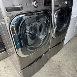 Graphite steel Front load lg  steam washer 5.2 cubic feet and front load lg steam dryer electric 9.5 cubic feet working great with warranty  extra for