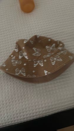 Tan butterfly bucket hat
