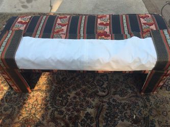 Decorative upholstered bench,nice piece can be used at the end of the bed or just to lift your feet and rest.