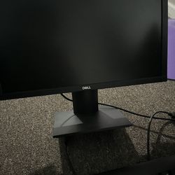 Two dell monitor and a keyboard