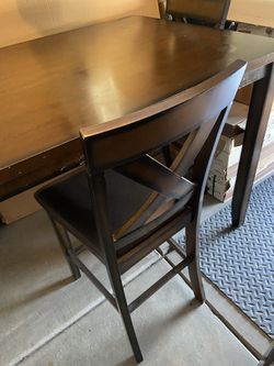 Dark Brown Dining Table (near Avondale Only)