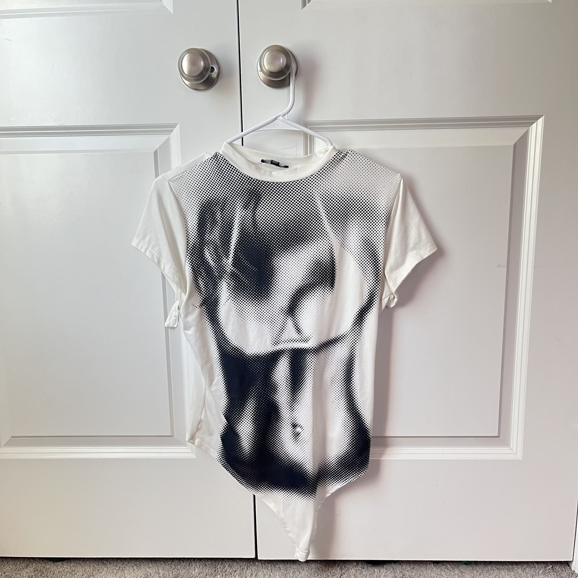 White and black bodysuit with a unique design #bodysuit