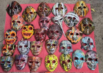 One of a kind, hand painted masks.