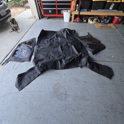 Soft Top With Side Tinted Windows. No Rear Window. 