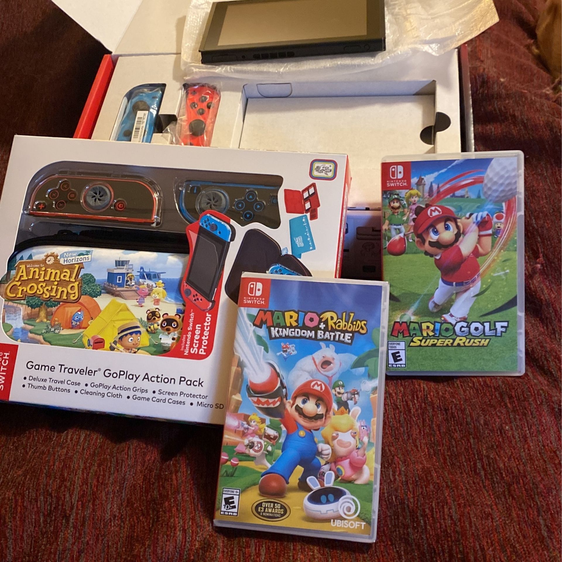 Nintendo Switch With Game Traveler Go play Action Pack And 2 Games