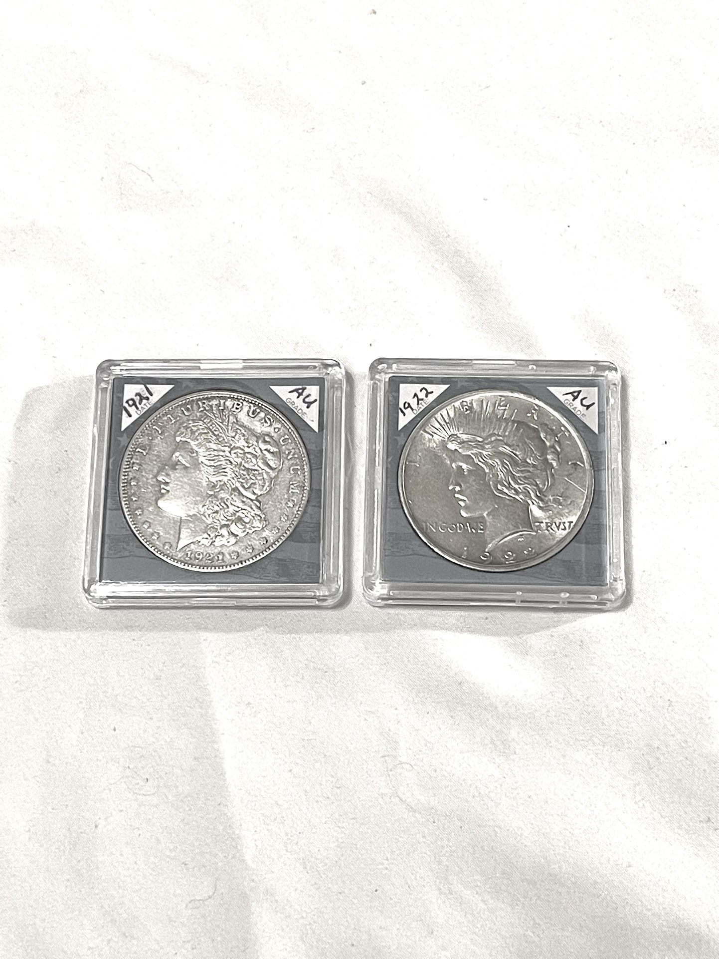 About Uncirculated-AU(50) Morgan, Silver Dollar & Peace, Silver Dollar.