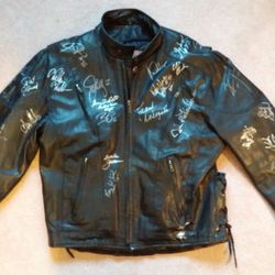 Men's celebrity autographed black leather motorcycle jacket, size 46
