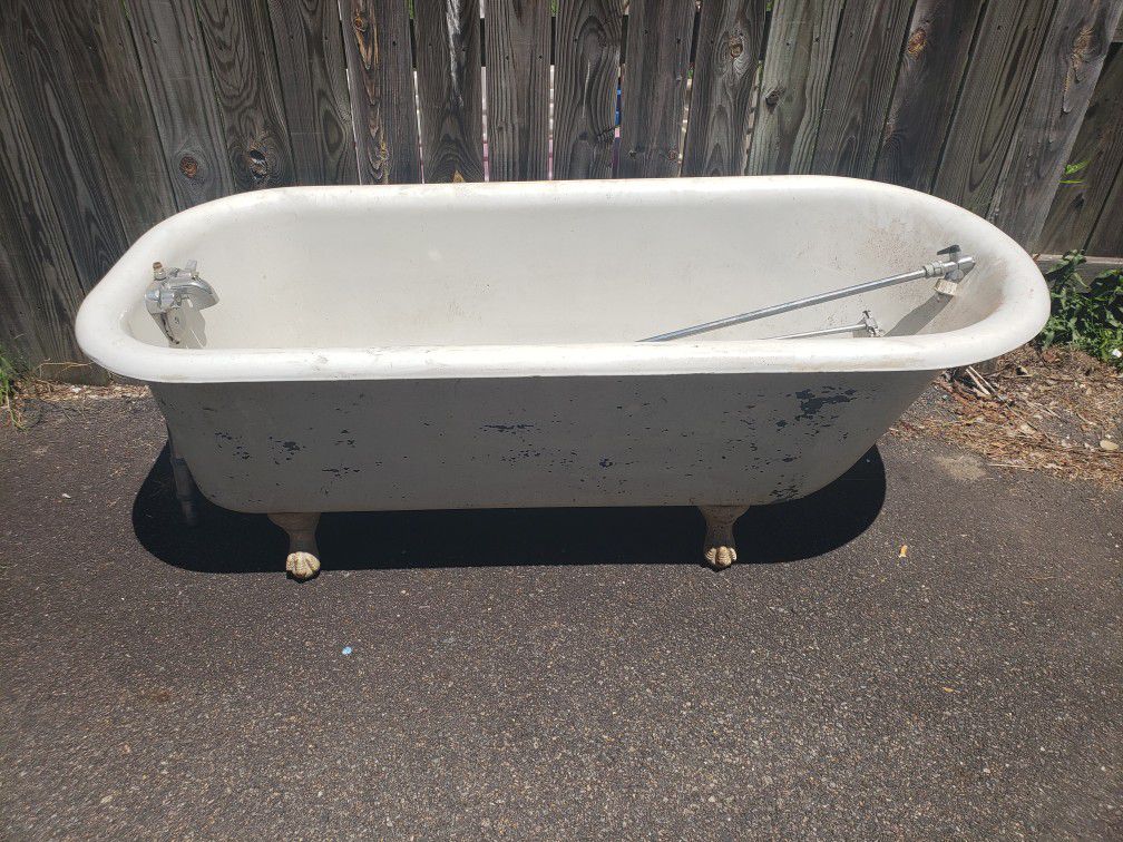 Antique Clawfoot Tub. 5 ft. With shower attachments.