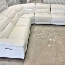 Like New 6 Months Old Sofia Vergera Leather Electric Quad Reclining Sectional Couch With Electric Headrests And Dual USB 