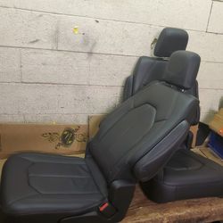 BRAND NEW BLACK LEATHER BUCKET SEATS 
