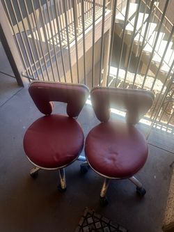Pair of Burgundy Rolling Salon Stools