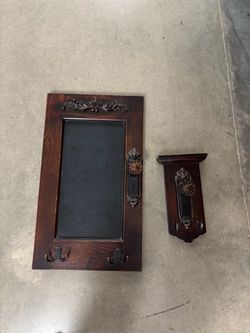 Wood vintage look chalkboard with hooks and hook.